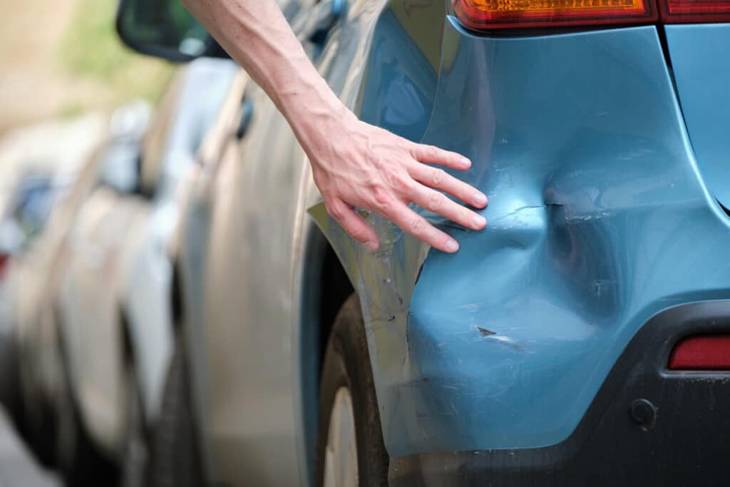 Signs of Hidden Car Fender Damage After a Fender Bender: Unveil how invisible damage can lurk beneath a slightly scuffed surface.